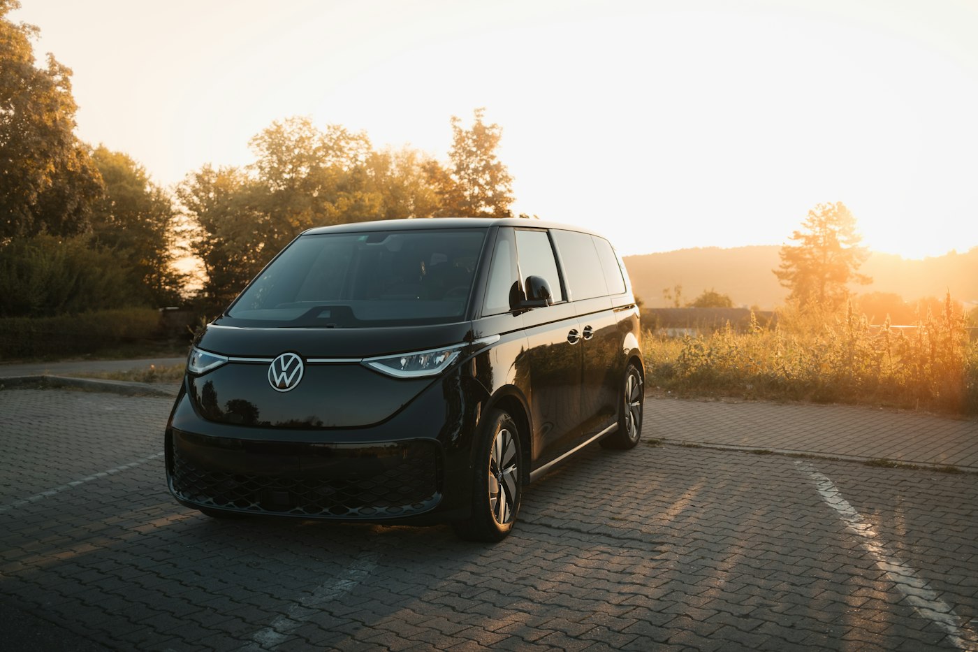 Minivan at sunset