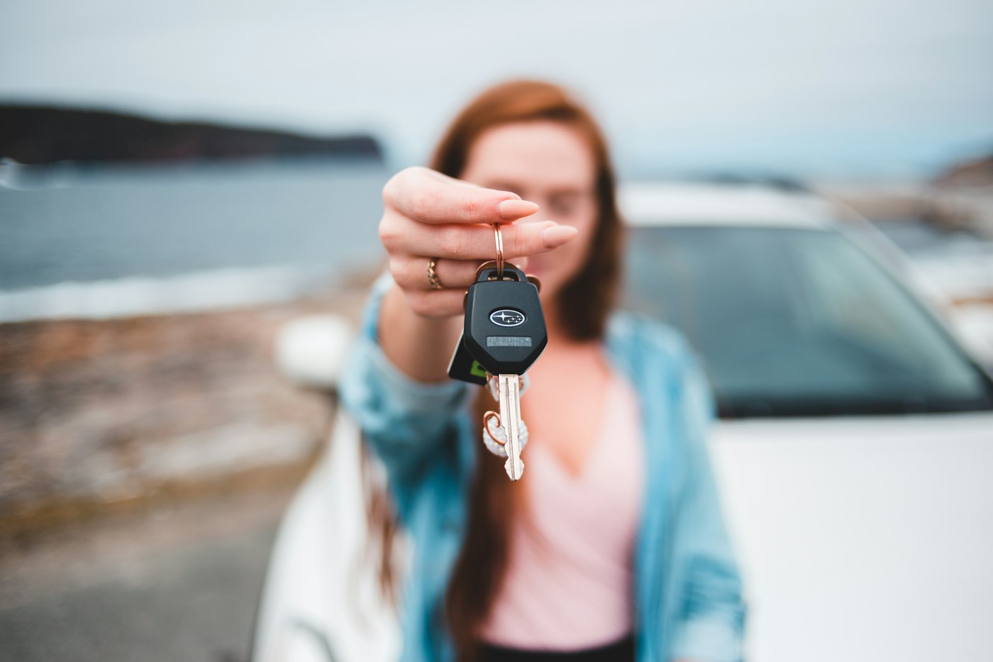 Customer holding the keys of her rental car